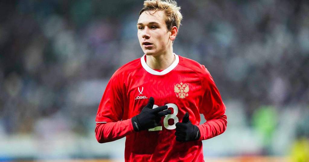 Lokomotiv Moscow midfielder Aleksey Batrakov controlling the ball during a match